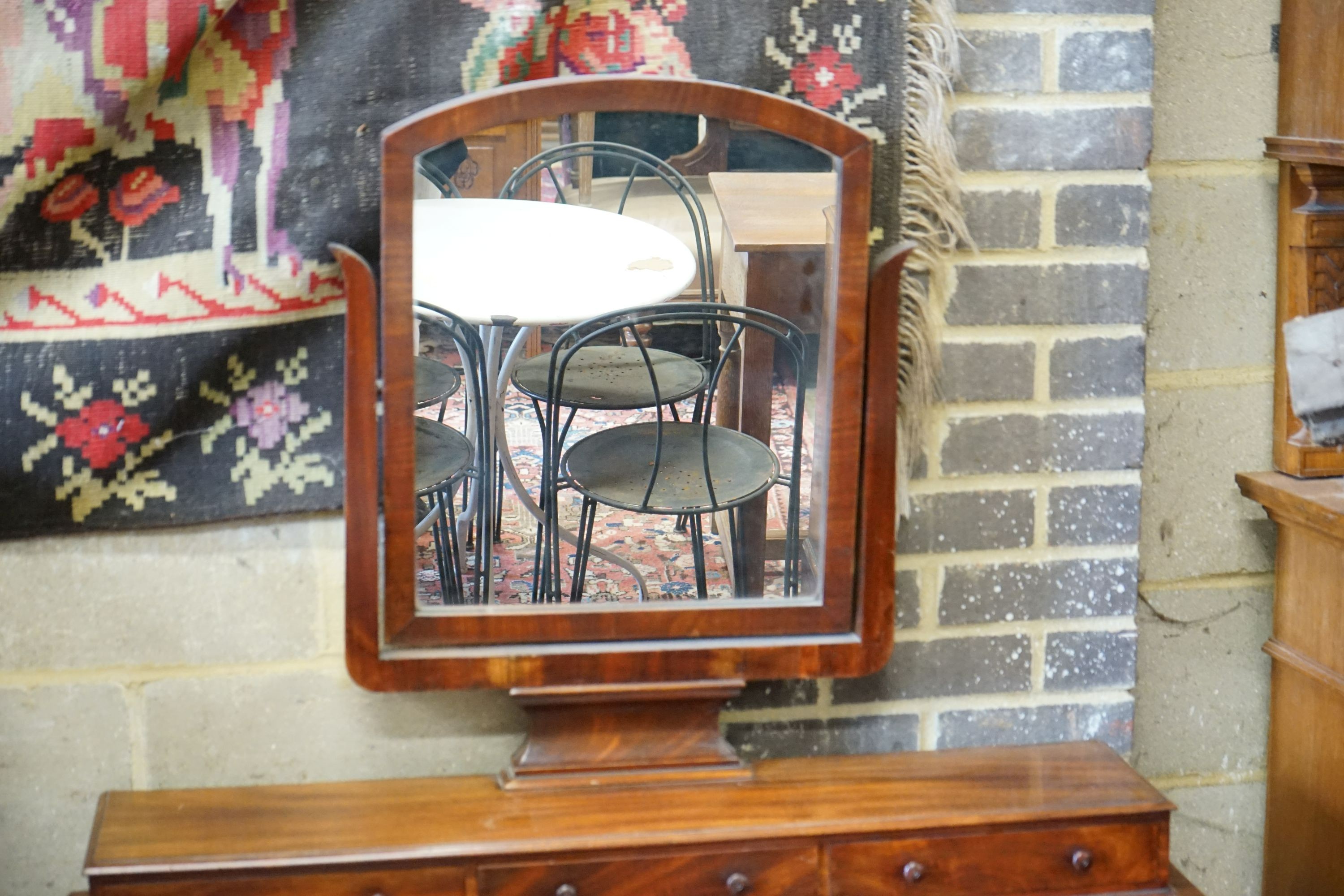 A Victorian mahogany kneehole dressing table, width 106cm, depth 55cm, height 144cm